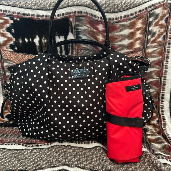 kate spade Handbags - Kate Spade Black and White Polka Dot Baby Bag with Red Changing Mat